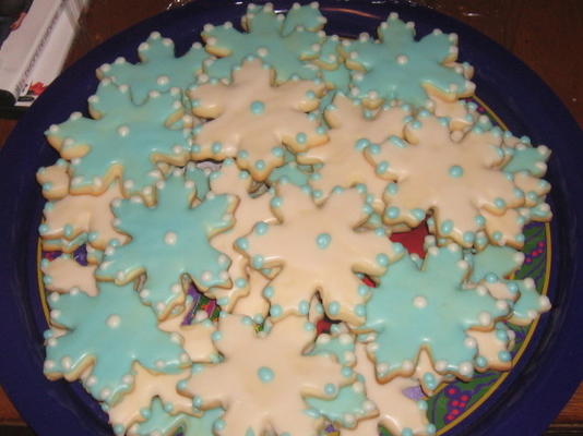 biscoitos de açúcar holandês cookie-cortador com esmalte branco de chocolate