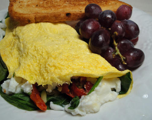 omelete de espinafre, tomate e ricota