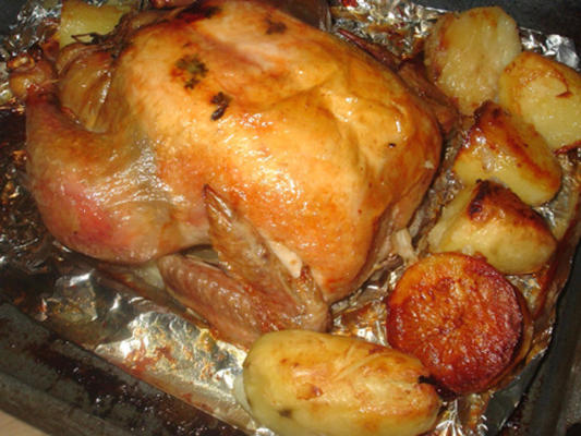 frango assado recheado com batatas