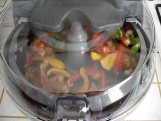 salsichas italianas e pimentas de actifry