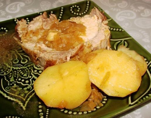 carne de porco assada com batatas amarelas