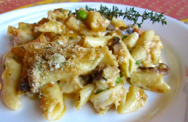 frutos do mar em penne e queijo assado